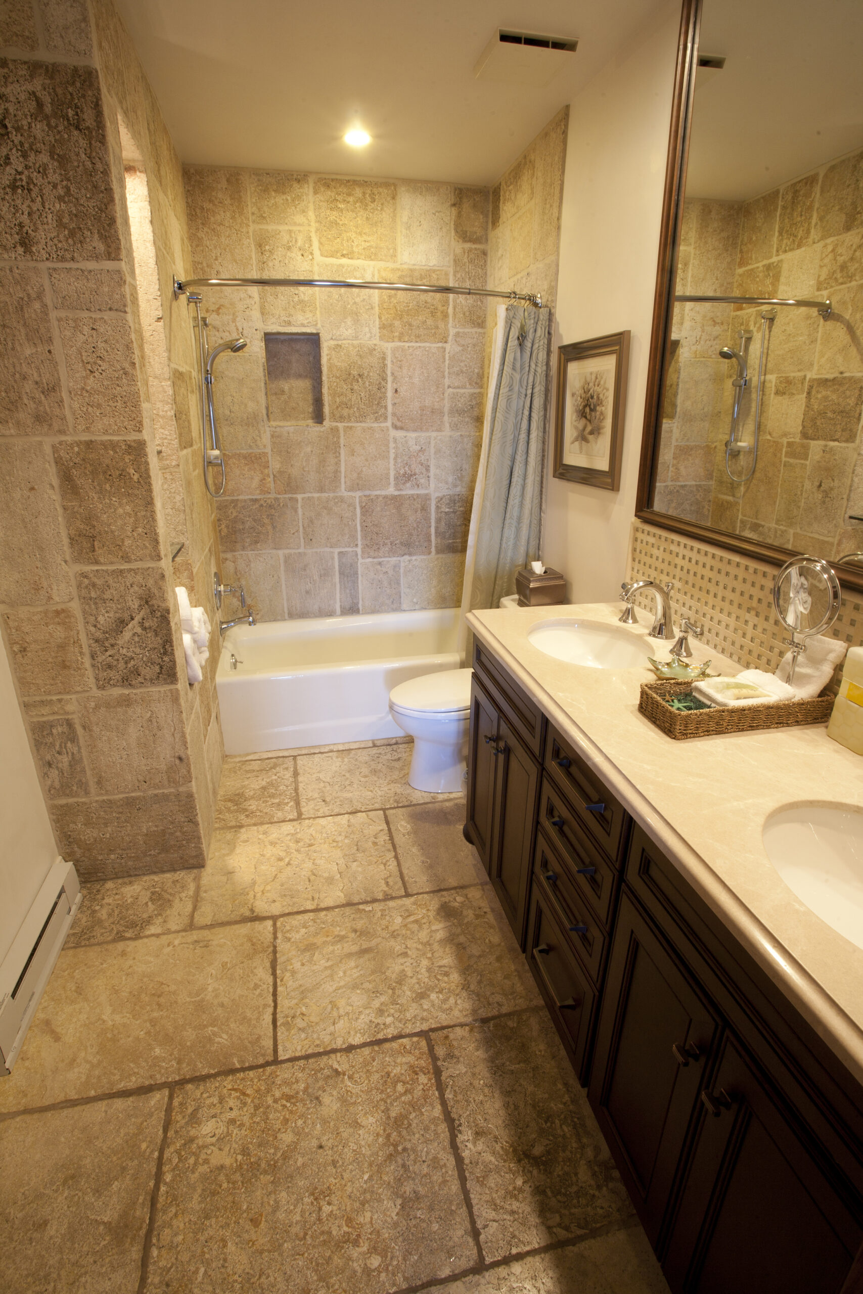 Bathroom with stone shower, tub and vanity